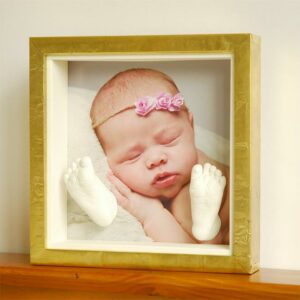 Babyvoetjes in luxe koperen lijst