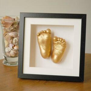 Babyvoet afdrukjes in een lijst